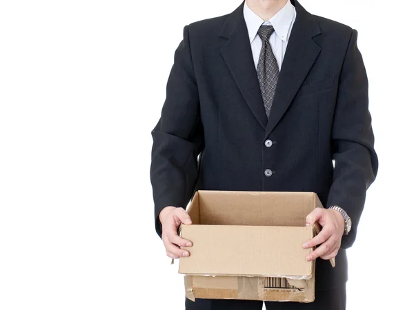 stock image Businessman holding box on white background