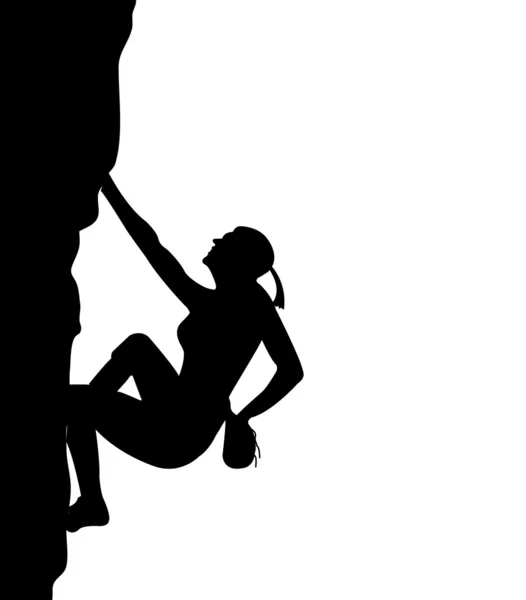 女性は岩に登る — ストック写真