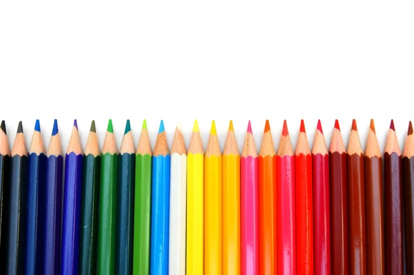 Lápis de cor sobre um fundo branco . — Fotografia de Stock
