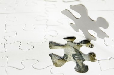 Puzzle pieces and US money clipart