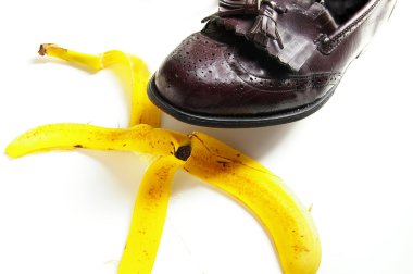 Man about to step on a banana peel, from above clipart