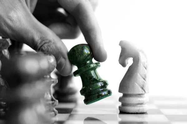 Moving a chess piece — Stock Photo, Image