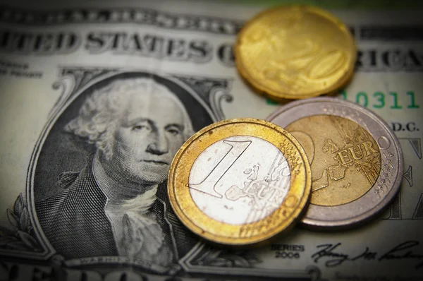 Stock image Dollar and Euro coins