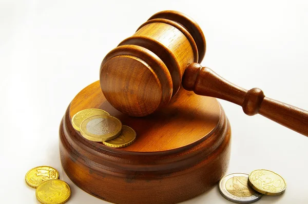 Assorted euro coins and judges court gavel — Stock Photo, Image