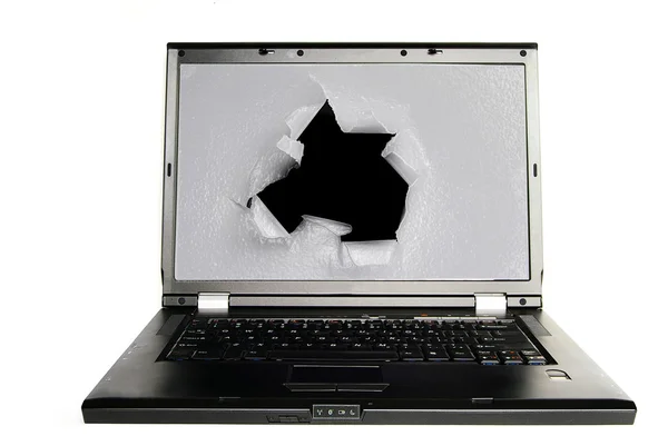 Computer portatile con un foro — Foto Stock