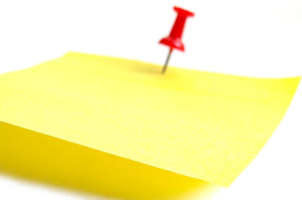 Yellow sticky note and tack — Stock Photo, Image