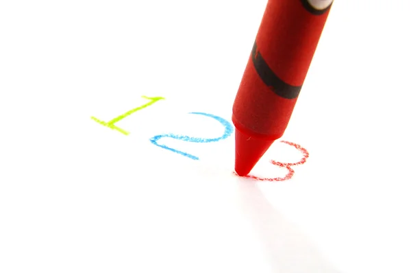 Rode crayon schrijven een twee drie op wit — Stockfoto