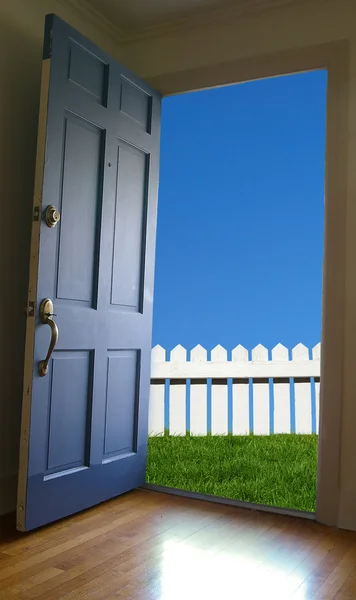 stock image Door opening to green grass