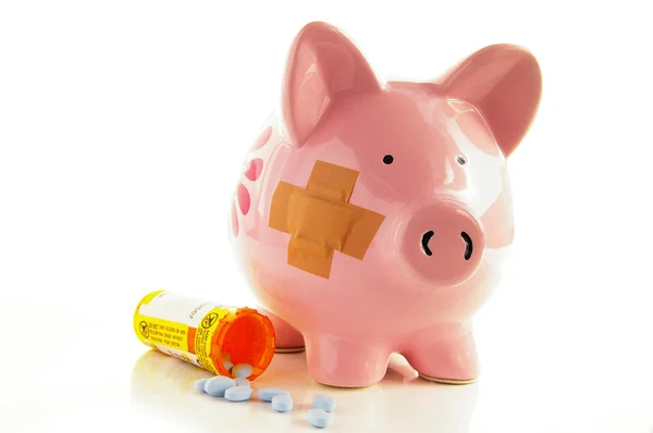 Bandaged Piggy bank — Stock Photo, Image