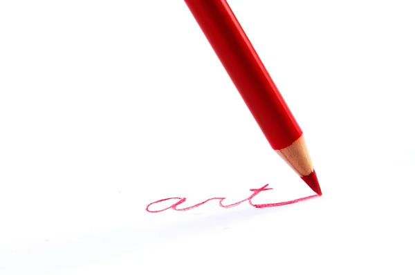 Cloasup της μια wrting κόκκινο μολύβι "τέχνη" — Φωτογραφία Αρχείου