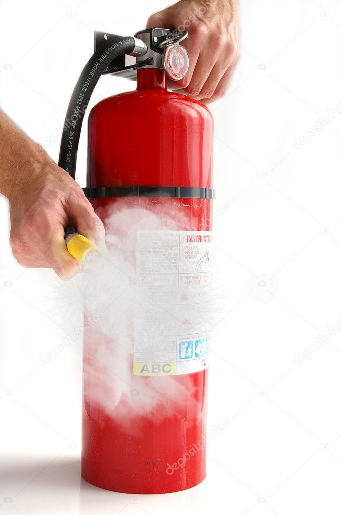 Spraying a fire extinguisher