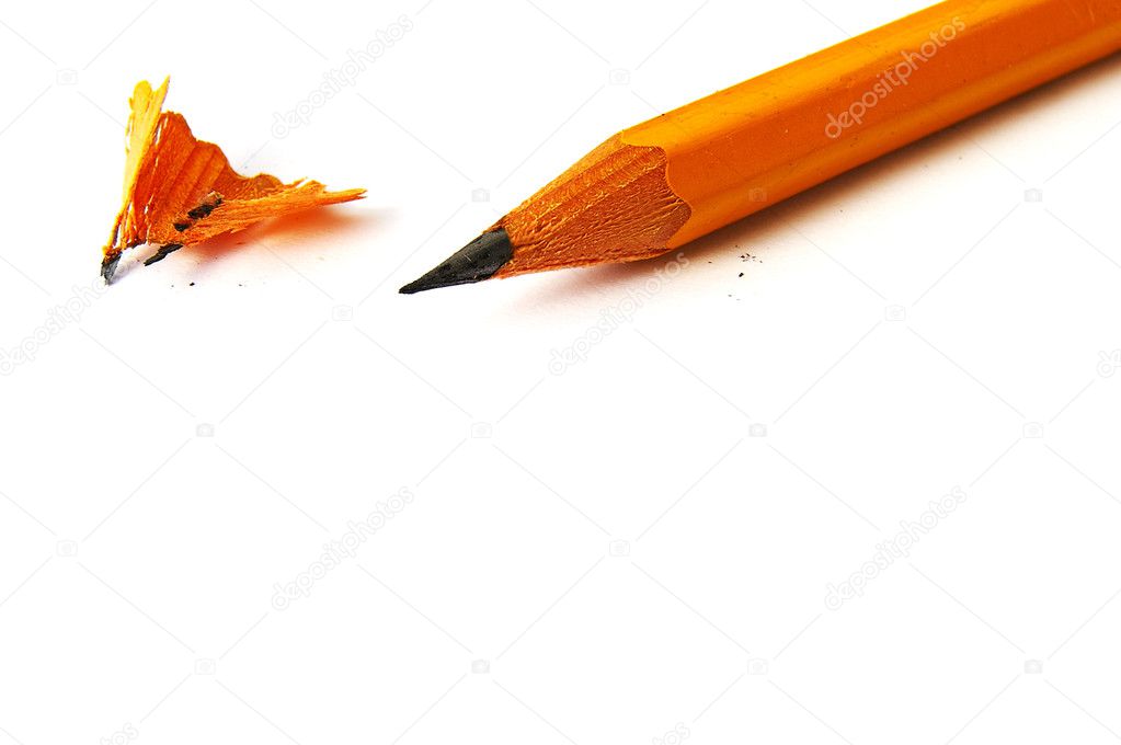 Closeup of a sharp pencil with shavings, isolated on white