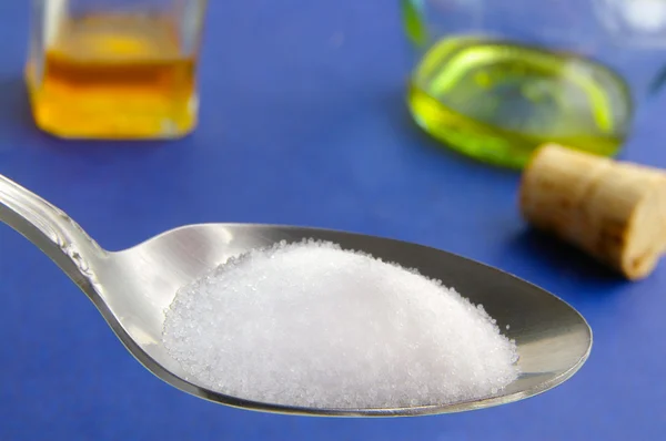 stock image Spoon full of brown cane sugar