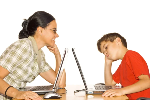 Frustrated boy working on a laptop computer — Stock Photo, Image