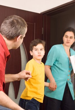 Boy between his parents clipart