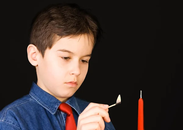Lighting a candle — Stock Photo, Image