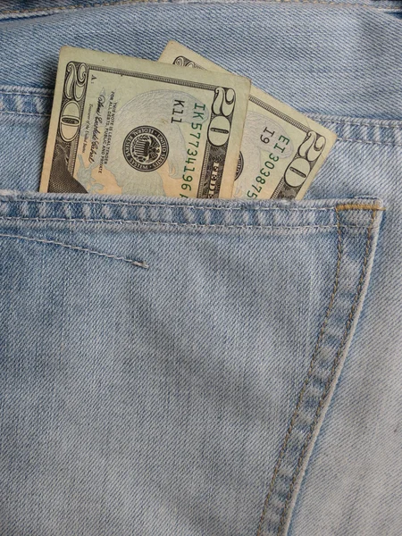 USD notes in blue jeans pocket — Stock Photo, Image