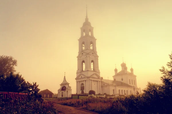 stock image Russian church in yellow fog in morning