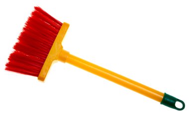 Children's toy plastic broom isolated on white background. clipart