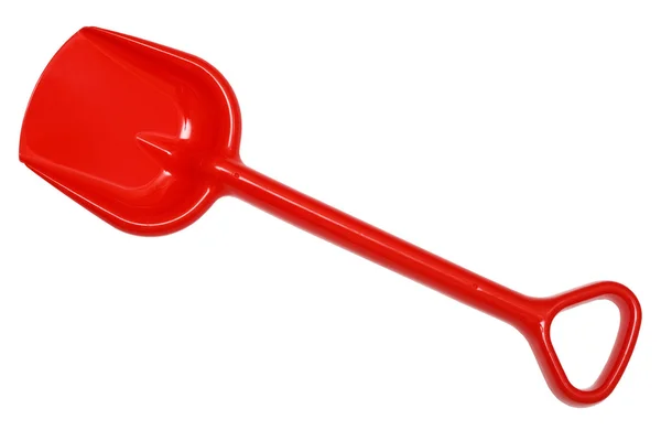 Red plastic toy shovel, isolated on a white background. — Stock Photo, Image