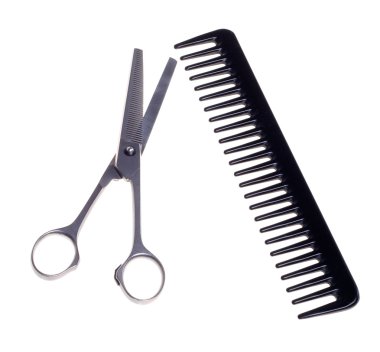 Hairdressing scissors and comb isolated on a white background. clipart