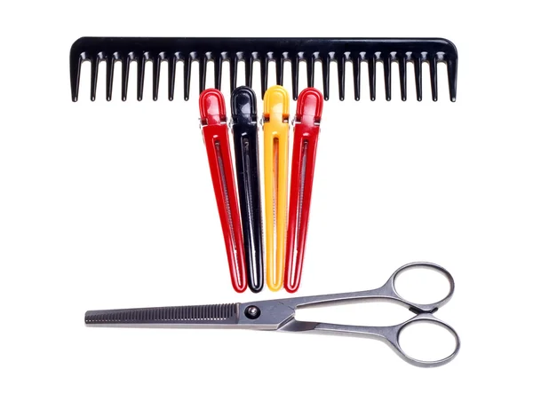 Hairdressing scissors, comb and clips isolated on a white backgr — Stock Photo, Image
