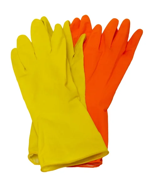 Оранжевые и желтые резиновые перчатки на белом фоне . — стоковое фото