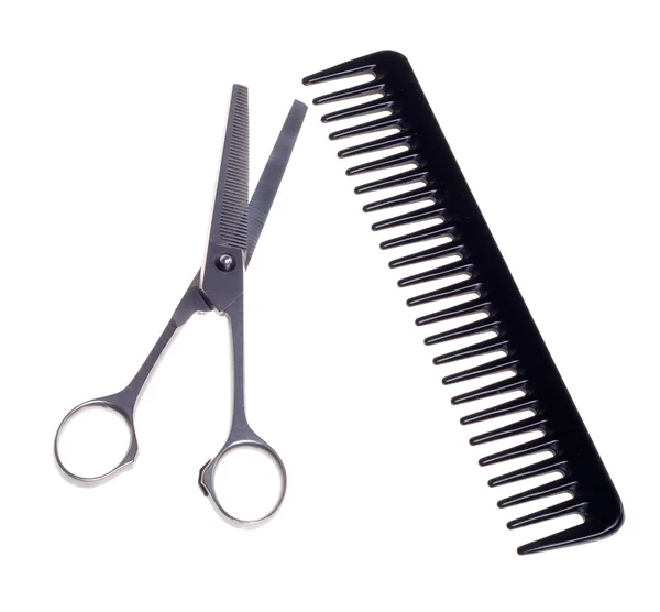 Hairdressing scissors and comb isolated on a white background. — Stock Photo, Image