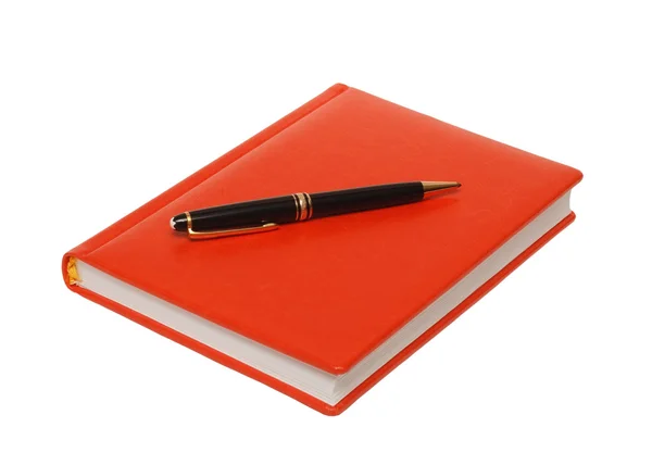 Ημερολόγιο πορτοκαλί και μαύρο στυλό σε λευκό φόντο . — Φωτογραφία Αρχείου