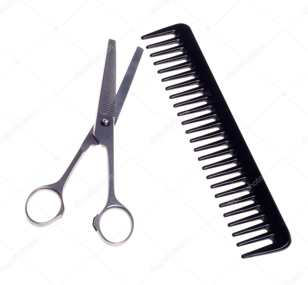 Hairdressing scissors and comb isolated on a white background. ⬇ Stock