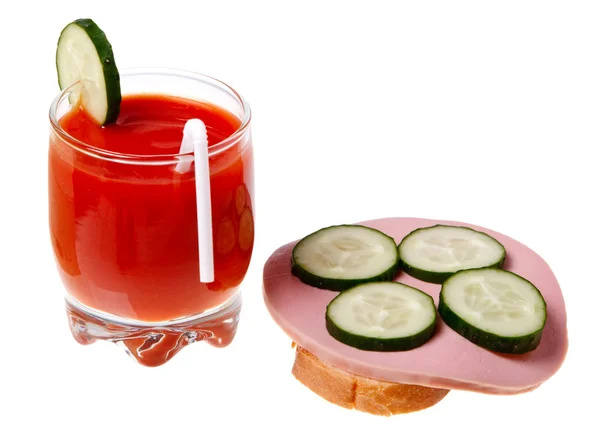 A glass of tomato juice and sausage sandwich isolated on white b — Stock Photo, Image