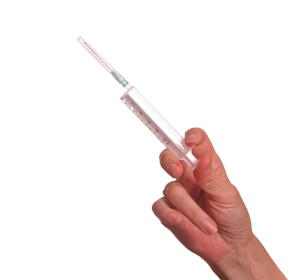Syringe in hand a nurse. — Stock Photo, Image