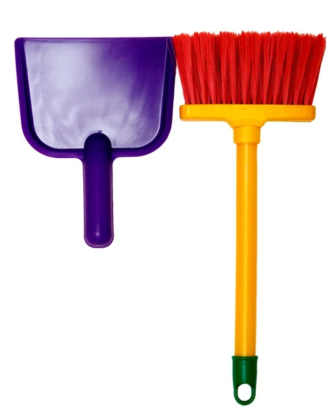 Toy plastic dustpan and broom isolated on a white background. — Stock Photo, Image