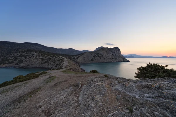 Sunrise on rocky coast of Black Sea — Stock Photo, Image