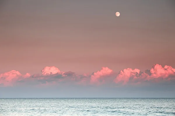 Sunset with full moon — Stock Photo, Image