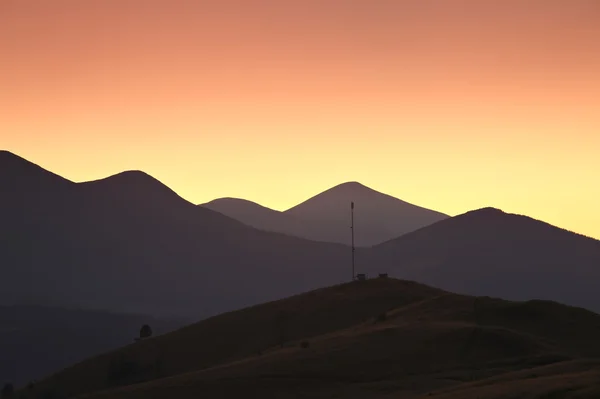 Гірські долини захід сонця — стокове фото