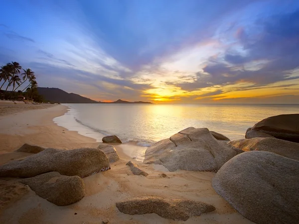 stock image Sunrise at tropical rocky coast