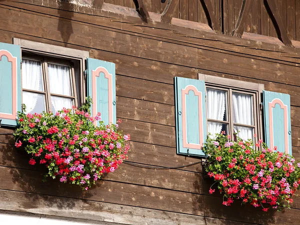 stock image Old house with flowers