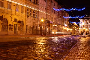 Traffic lights at old European city clipart