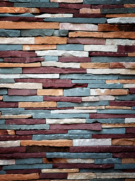 Барвиста кам'яна текстура стін — стокове фото