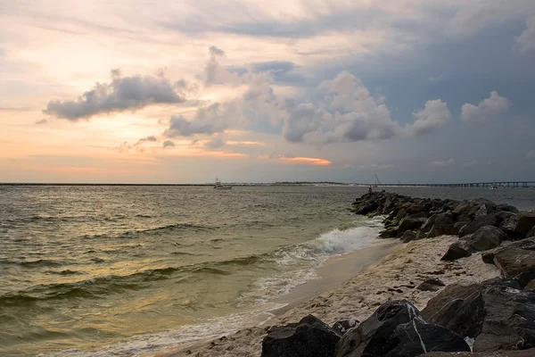 Sunset on the rocky beach — Stock Photo, Image