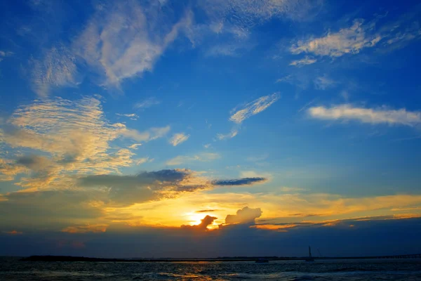 Orange and blue sunset on ocean — Stock Photo, Image