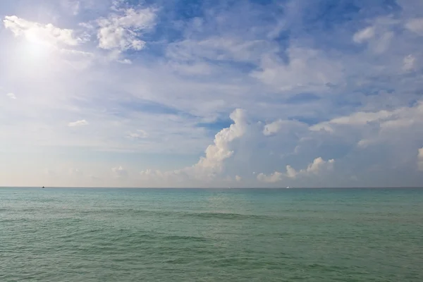 Sunshine in blue sky under ocean — Stock Photo, Image