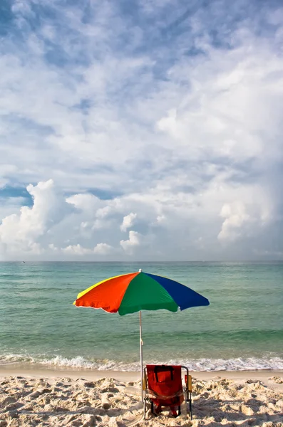 Beach umbrella and chair — Stock Photo, Image