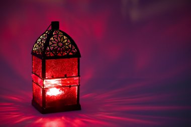 Burning lantern in the dark clipart