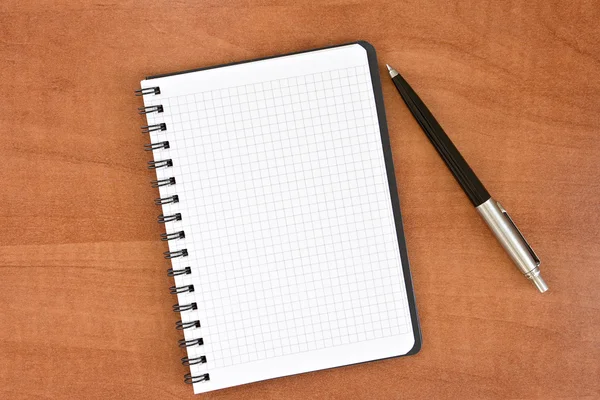 Pen and note-book — Stock Photo, Image