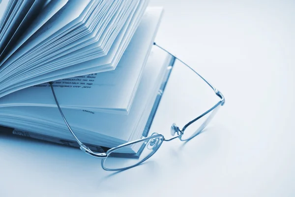 Close up of the book with glasses — Stock Photo, Image
