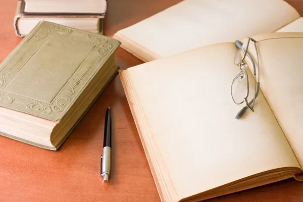 stock image Books, pen and glasses