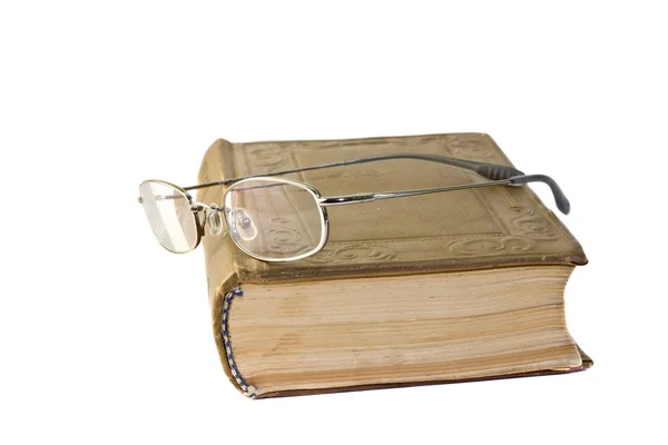 Old book with glasses — Stock Photo, Image