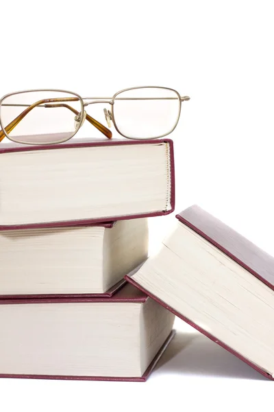 Pilha de livros e óculos — Fotografia de Stock